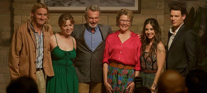 PERFECT? (Left to right) Logan (Conor Merrigan-Turner), Brooke (Essie Randles), Stan (Sam Neill), Joy (Annette Bening), Amy (Alison Brie), and Troy (Jake Lacy) are the dysfunctional Delaney family in Apples Never Fall, streaming on Peacock.