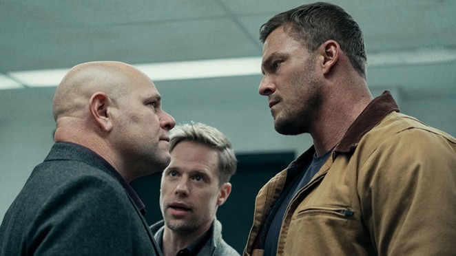 TESTOSTERONE TANGO: (Left to right) Cop Gaitano “Guy” Russo (Domenick Lombardozzi), David O’Donnell (Shaun Sipos), and Jack Reacher (Alan Ritchson) are thrown into an international arms dealing conspiracy in Reacher, season 2, streaming on Amazon Prime.