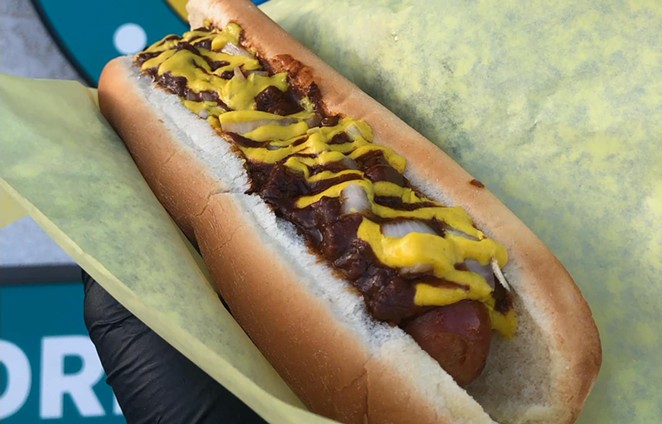 SEMINAL CONDIMENTS: Chili, onions, mustard, and more are among the topping selections at California Hot Dogs, through both its long-standing food cart in Avila Beach and new drive-through restaurant in Santa Maria.