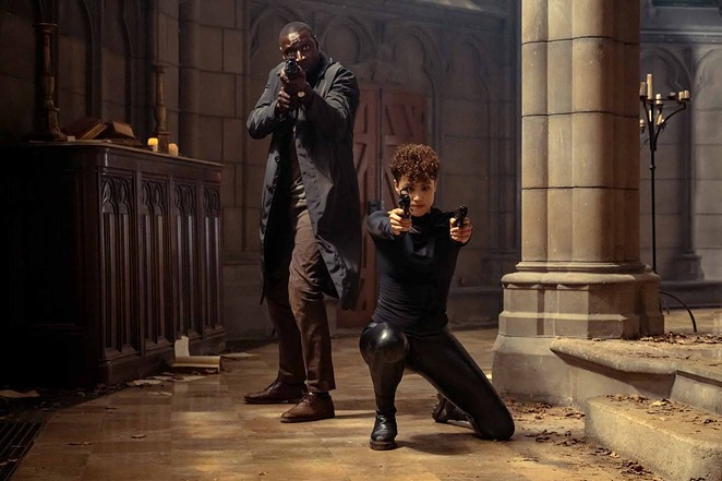 TEAM UP: To battle a worse enemy, Paris detective, Sey (Omar Sy), joins forces with Zee (Nathalie Emmanuel), an assassin, in The Killer, streaming on Peacock.