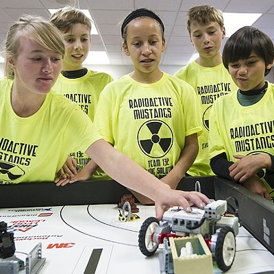 Techno teamwork: Local robotics teams like Orcutt Academy High School's Spartatroniks build, program, and compete with their custom bots