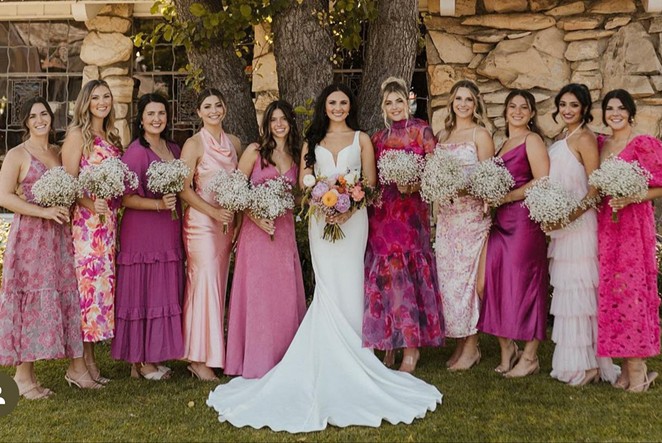 COLOR POPS: Moving away from wearing the same dress and color, brides have embraced different styles and shades to best complement those in their bridal party.